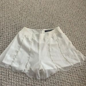 Scalloped white shorts